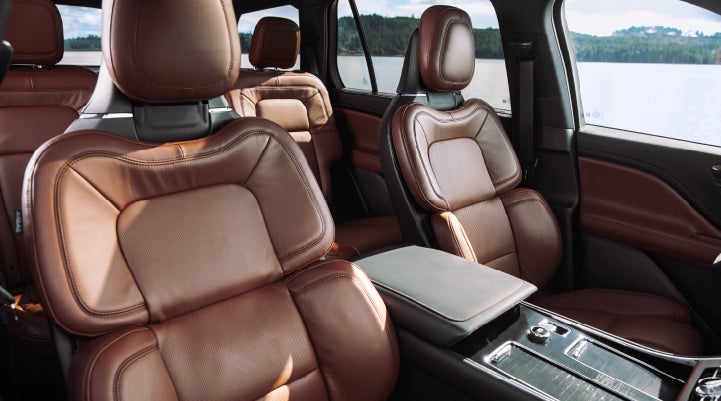 The front row's Perfect Position Seats in a 2024 Lincoln Aviator® Reserve model with Ebony Roast interior | Lincoln of Cutler Bay in Miami FL
