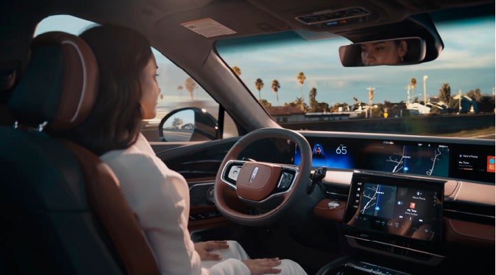 A person is shown driving hands-free on the highway with available Lincoln BlueCruise technology. | Lincoln of Cutler Bay in Miami FL