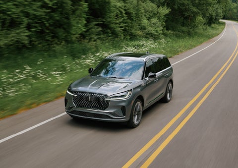 A 2027 Lincoln Aviator® SUV is being driven down a road. | Lincoln of Cutler Bay in Miami FL
